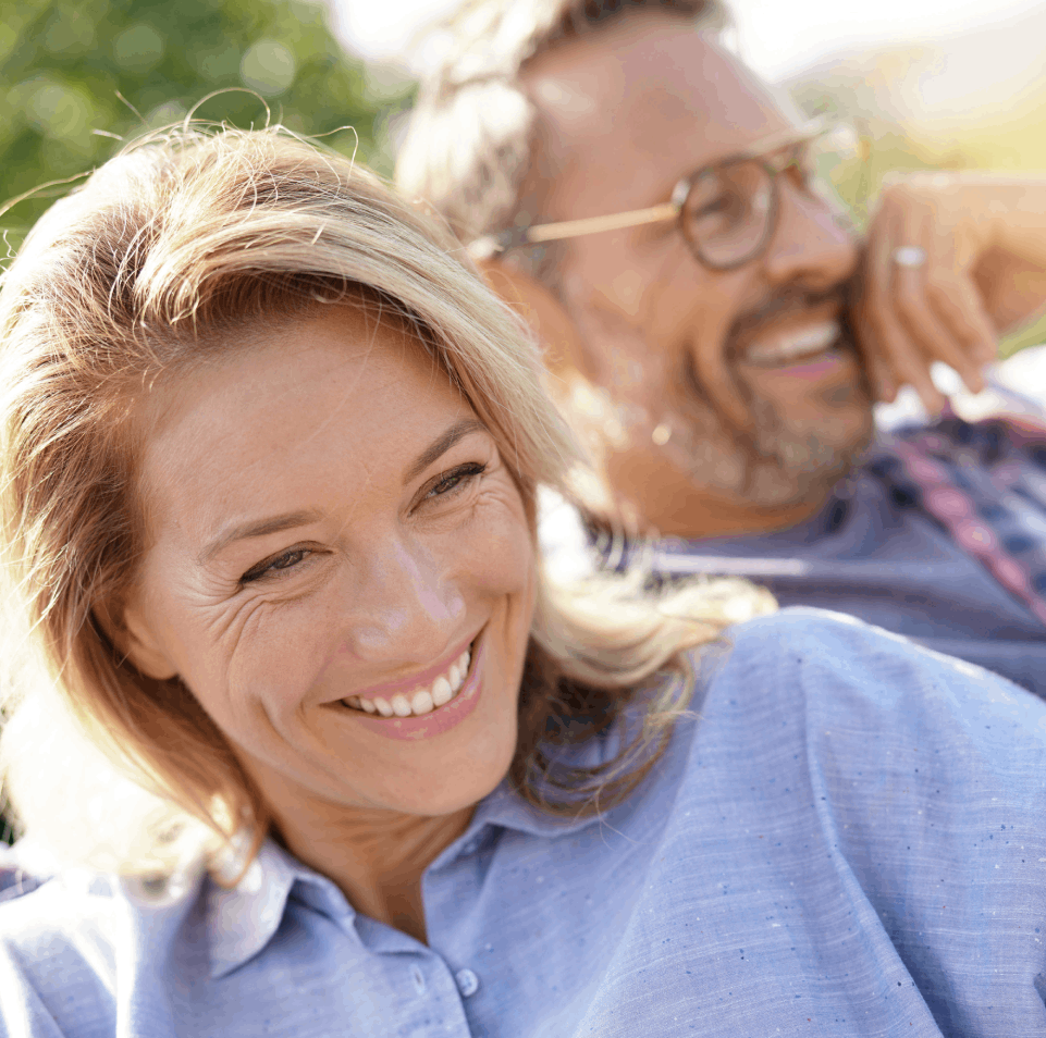 Smiling woman and man outdoors, Look Your Best aesthetic treatments