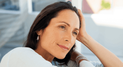 Jeuveau for wrinkles leaves a middle-aged woman with smooth, youthful skin and a relaxed, natural look.